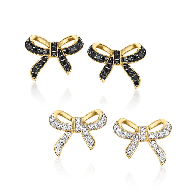 Gold bow stud earrings set with black and clear stones, two pairs, post backs