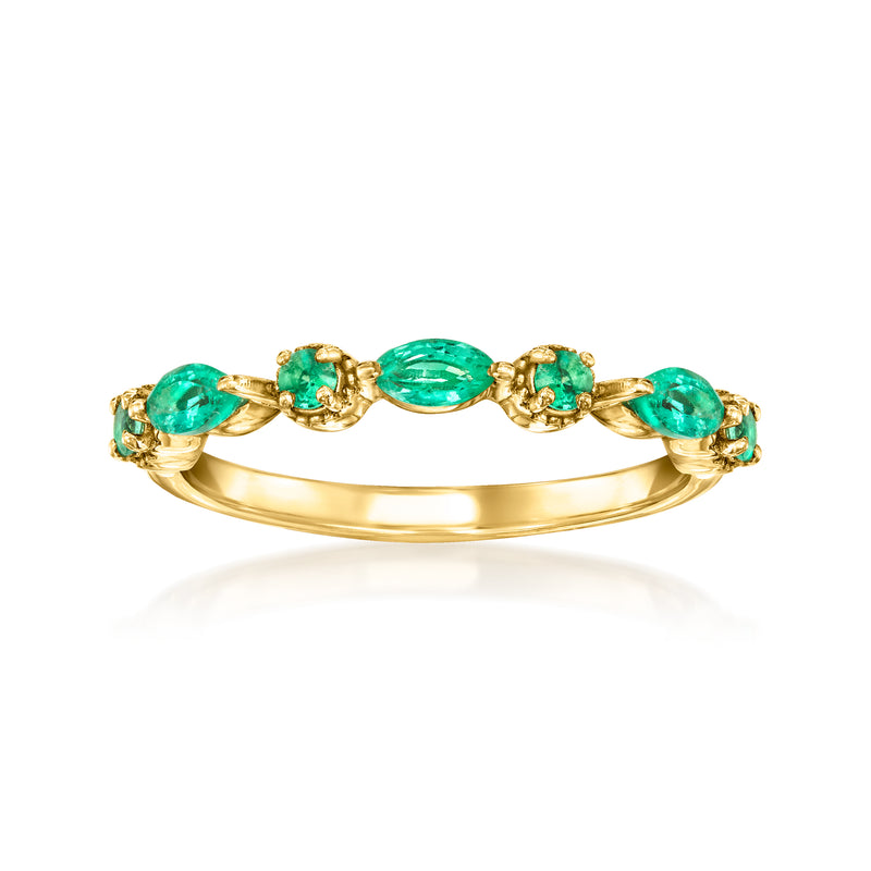 14kt yellow gold ring with oval green emerald-cut gemstones across the band