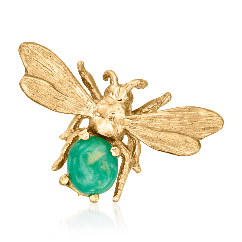 Vintage gold insect pin with emerald-green oval gemstone and detailed wings