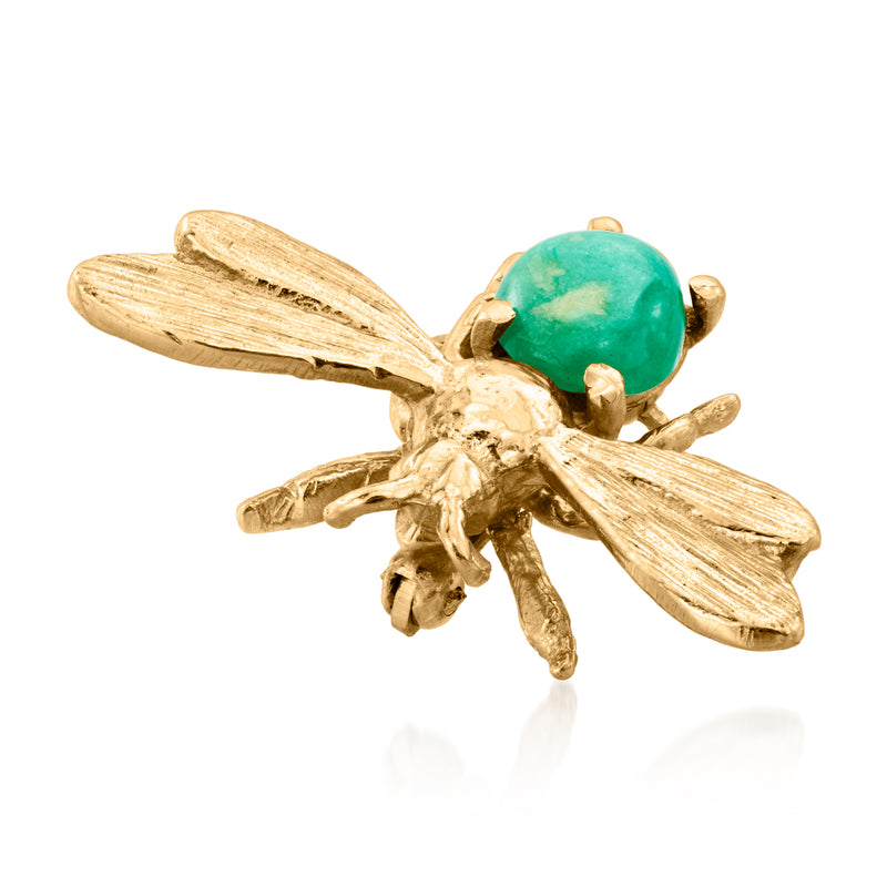 Gold insect pin with green oval gemstone, side view of wings and legs