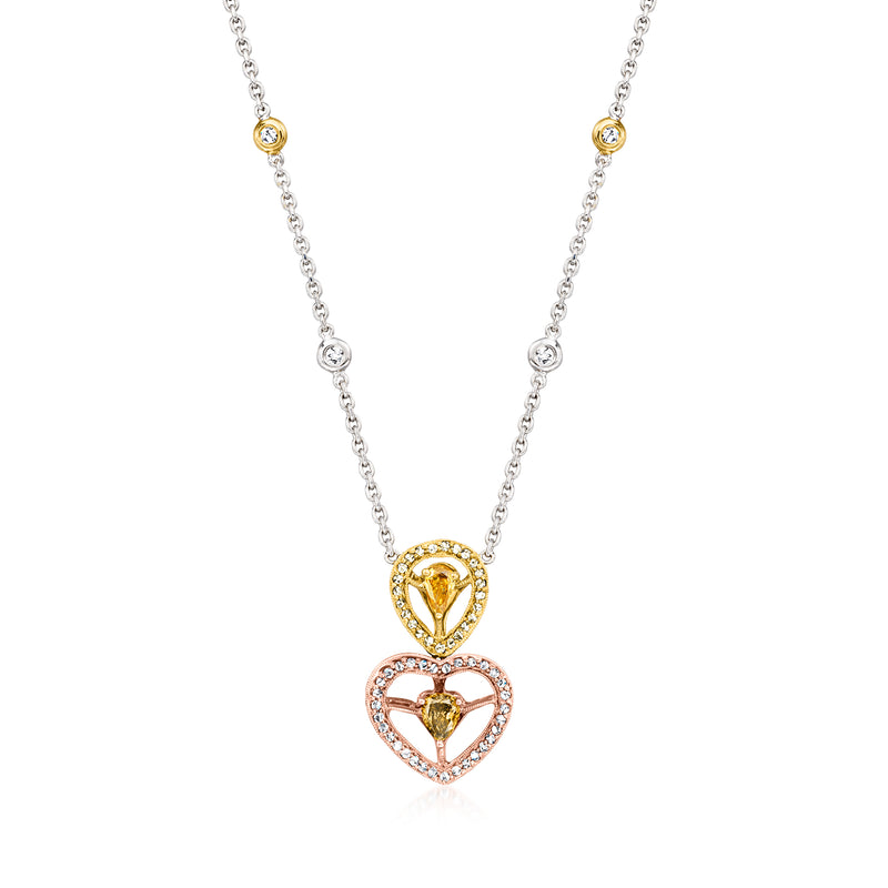 Tri-colored gold diamond heart necklace with three linked hearts on a chain