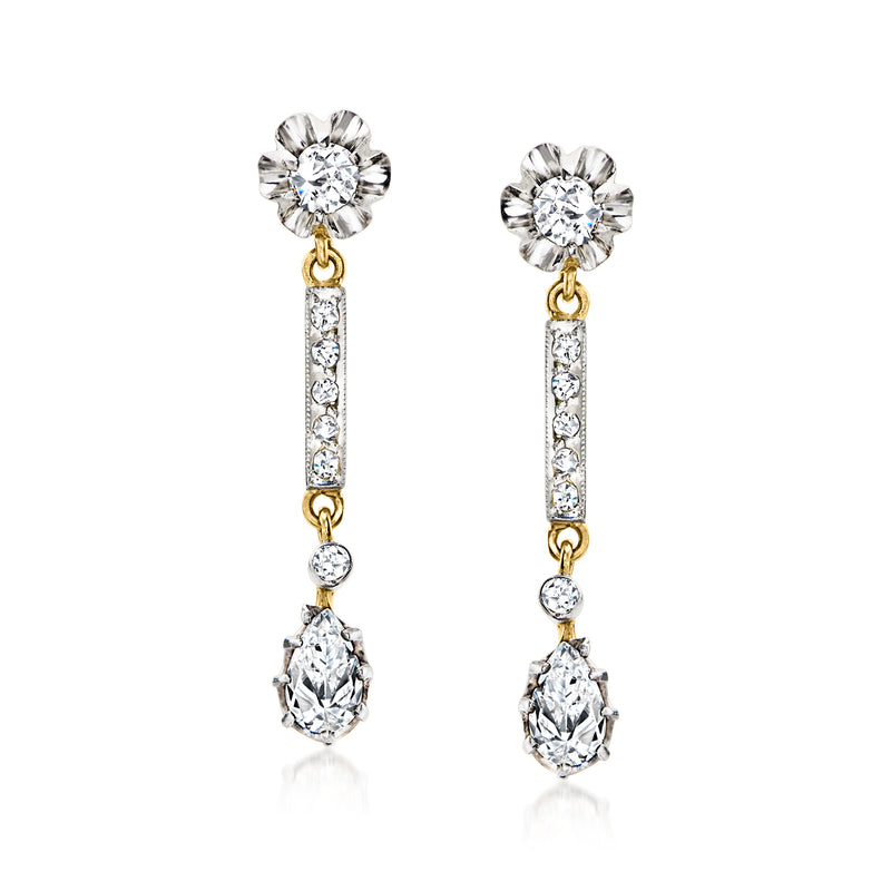 Diamond drop post earrings with flower tops, bar details, and dangling teardrop stones