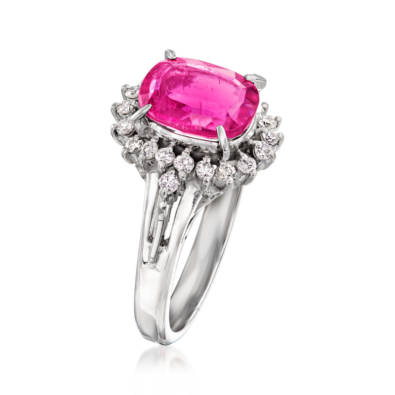 Platinum oval pink tourmaline ring with diamond cluster halo, side view