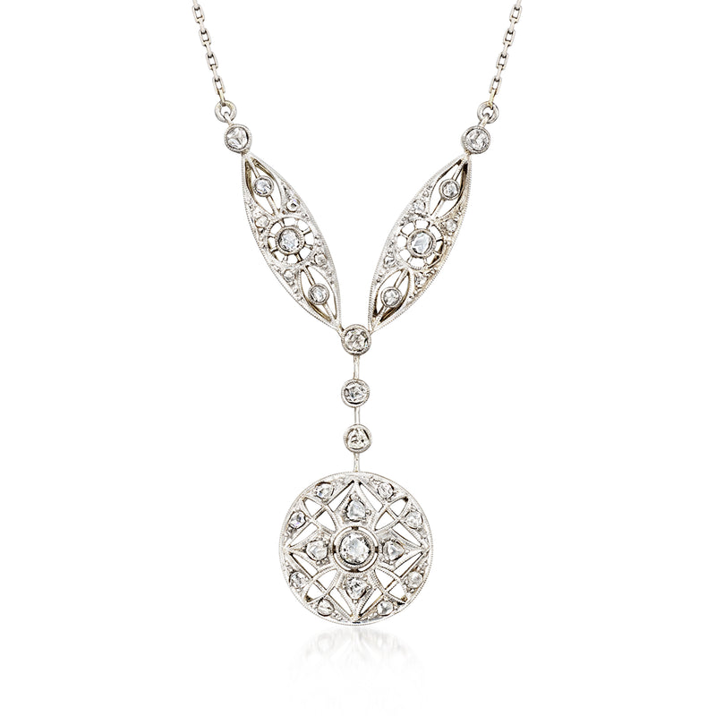 Platinum-toned diamond filigree drop necklace with round medallion pendant and chain