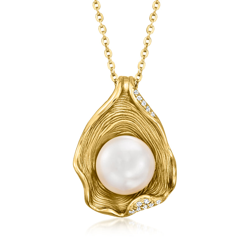 Gold-tone teardrop pendant necklace with white pearl center and small CZs