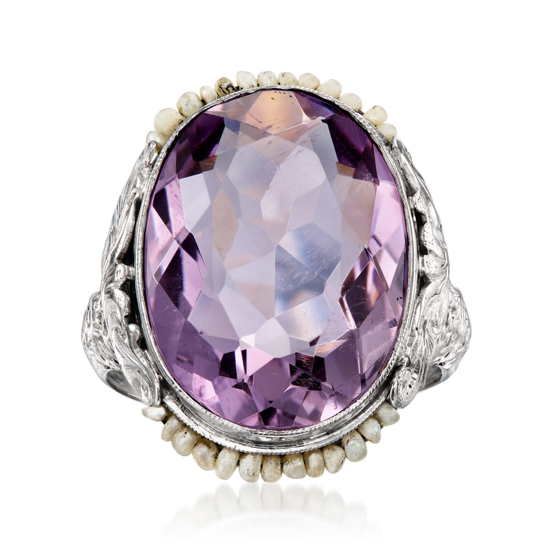 Amethyst gemstone ring in white gold with oval purple stone and seed pearl halo