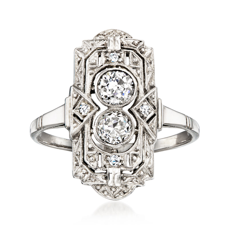 14k white gold vintage filigree ring with three round diamonds in rectangular setting