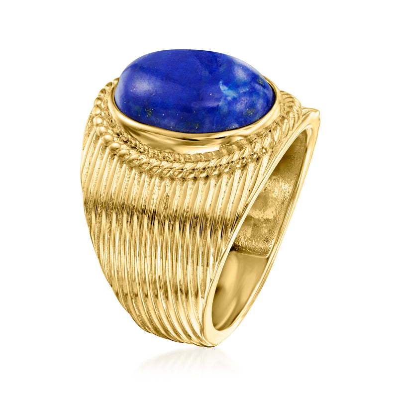 Gold-tone oval lapis cabochon ring with ridged band and textured shoulders