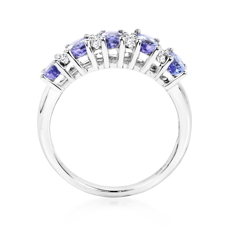 Sterling silver ring with prong-set oval blue stones and white topaz details