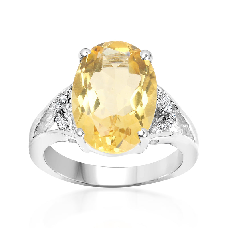 Sterling silver ring with oval yellow citrine center and diamond side accents