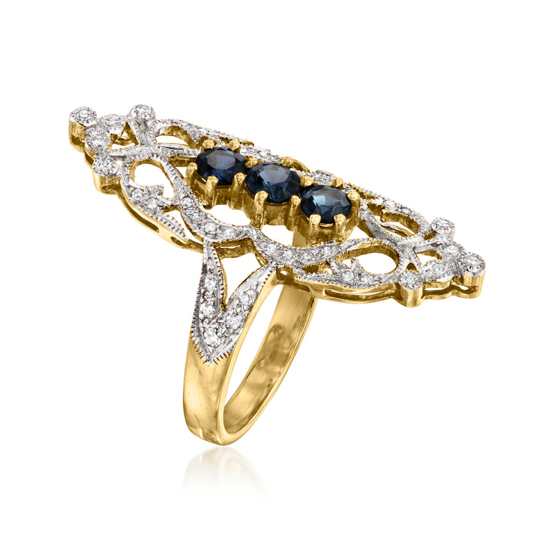 18k yellow gold marquise-style ring with three blue sapphires and diamond accents