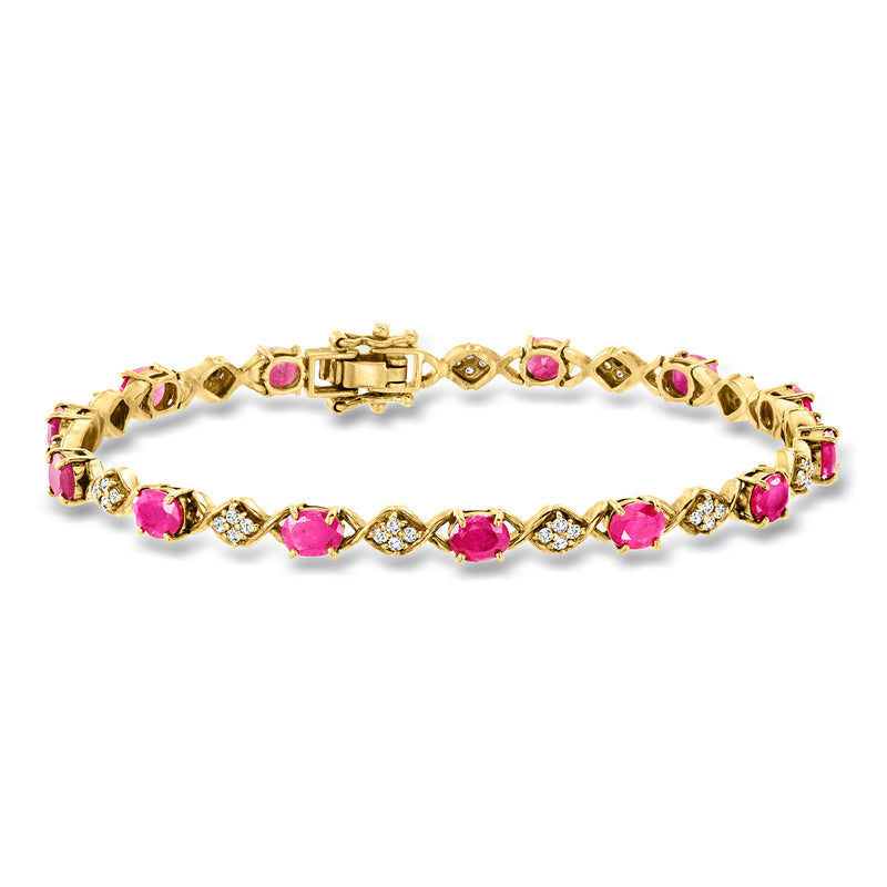 Yellow gold ruby and diamond tennis bracelet with pink gemstone links and sparkle accents