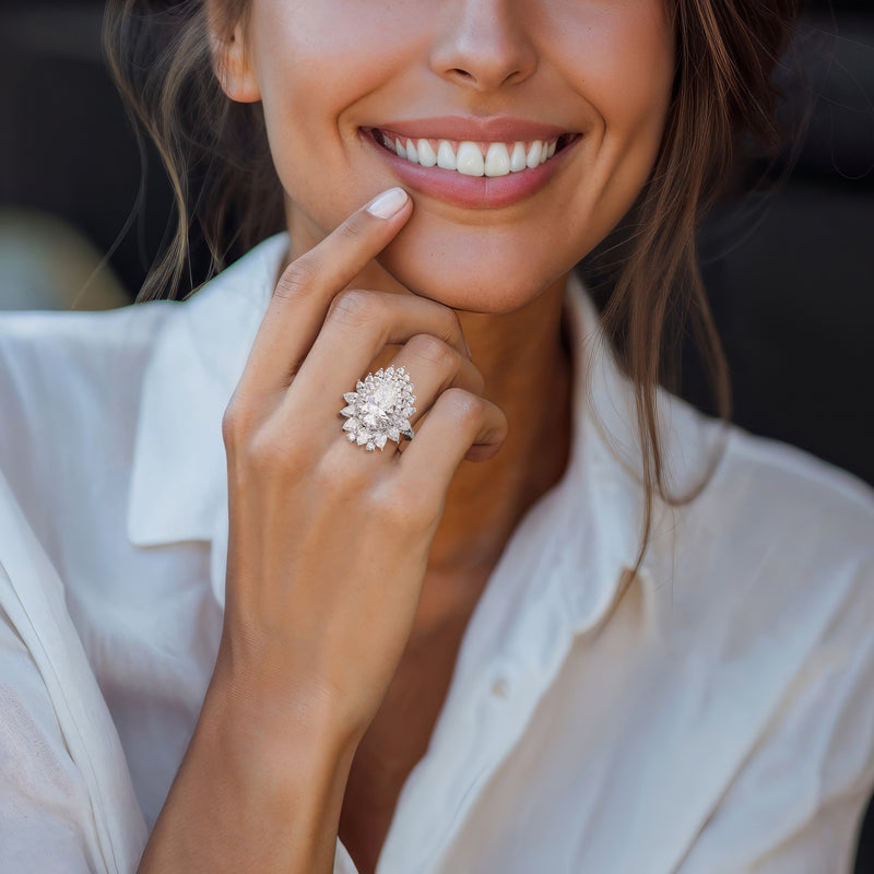 14kt white gold lab-grown diamond halo ring on hand, close-up of center stone