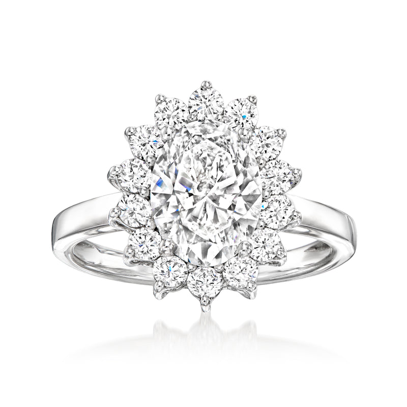14kt white gold diamond ring with large round center and flower halo