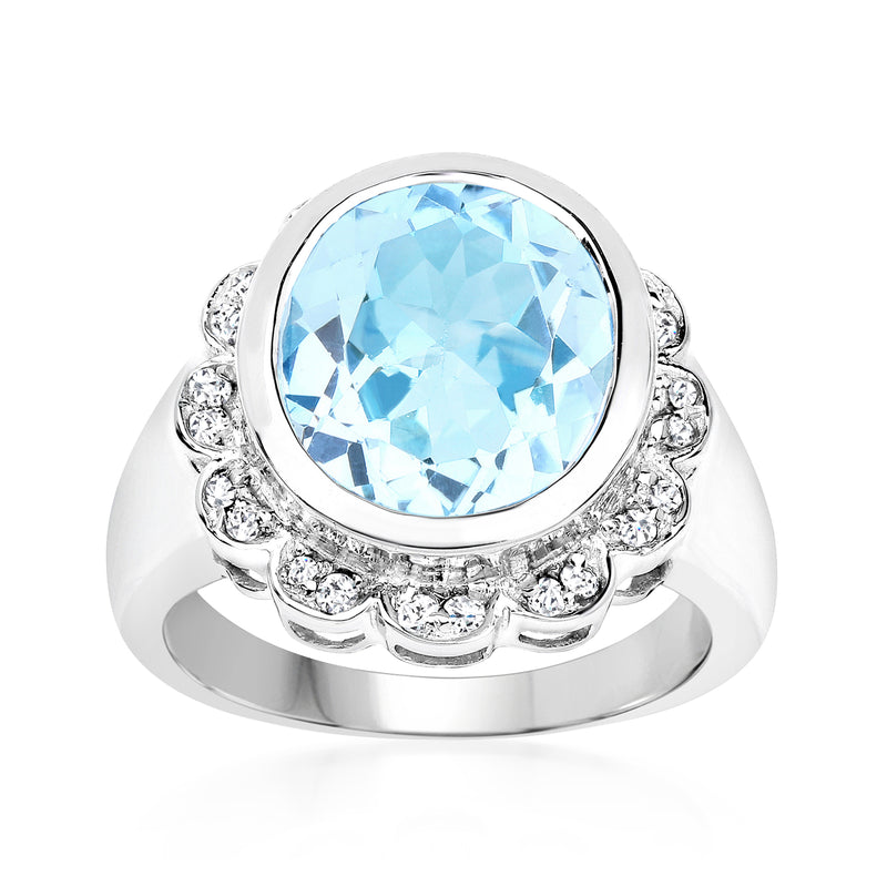 Oval Swiss blue topaz ring in sterling silver with white stone clusters
