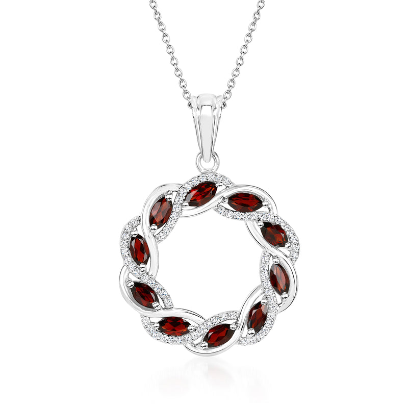 Sterling silver circle pendant necklace with red garnet and white topaz inlay