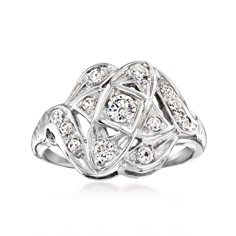 Vintage 14kt white gold diamond cluster ring with round stones, geometric bezel setting