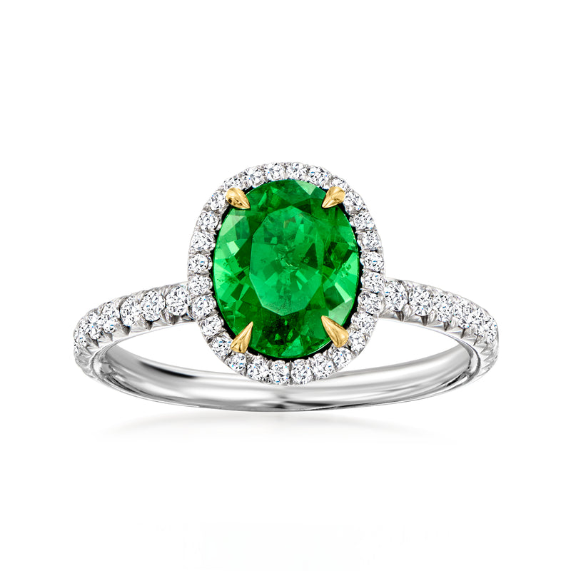 Vintage green oval gemstone halo diamond ring in white gold with gold prongs