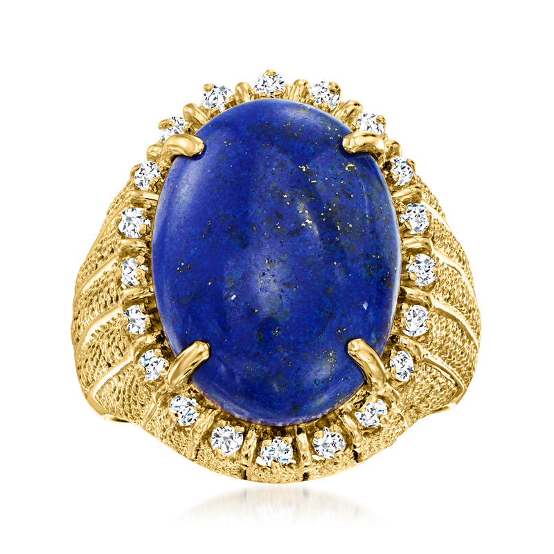 Vintage oval lapis cabochon ring in 18k yellow gold with round diamond halo