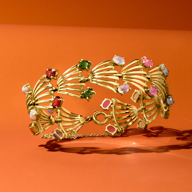 14kt yellow gold fan bracelet with green, red, pink, and white gemstones