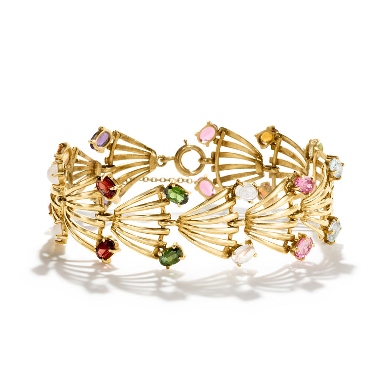 14kt yellow gold fan bracelet with pink, purple, red, and green gemstones