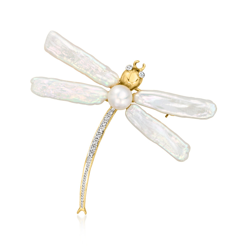 Yellow gold dragonfly pin with white pearl body and opalescent wing accents