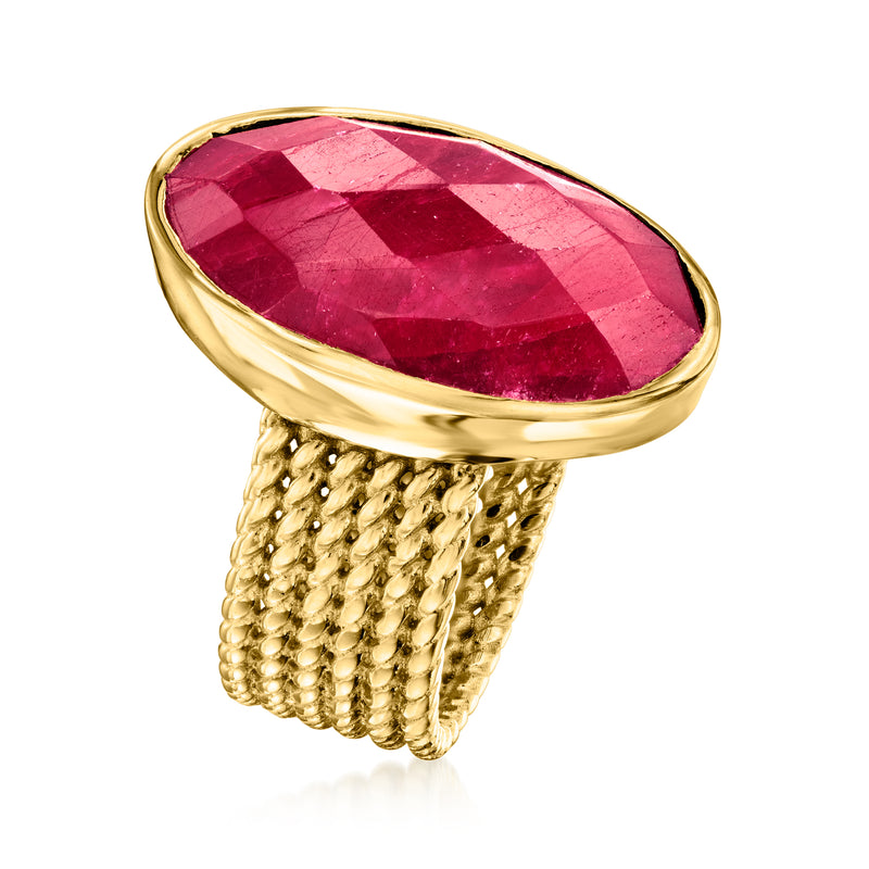 Gold over sterling ring with large oval faceted ruby red stone and braided top band