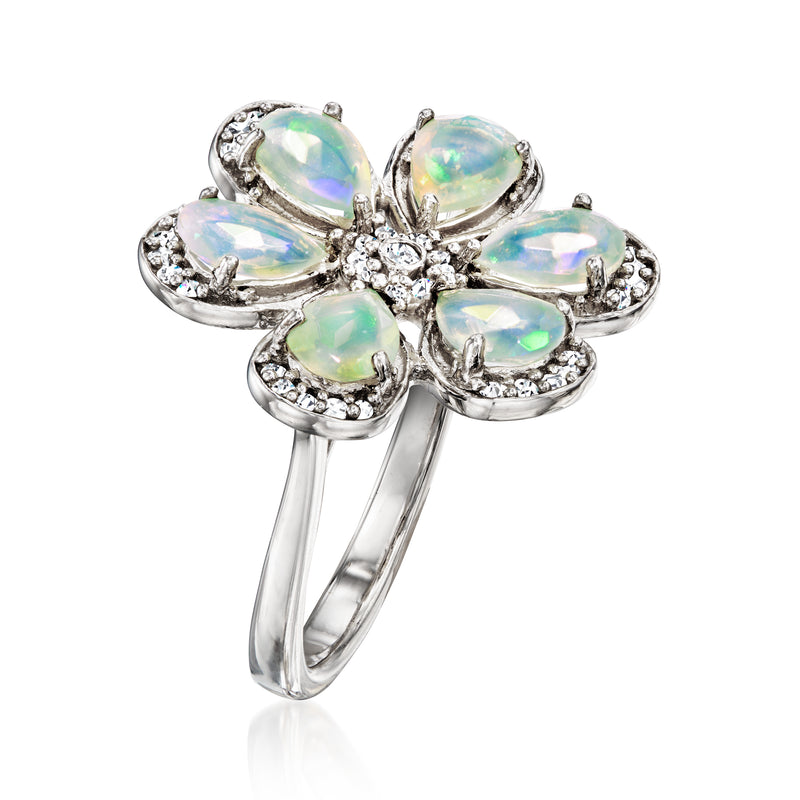 Sterling silver flower ring with opal petals and white topaz accents