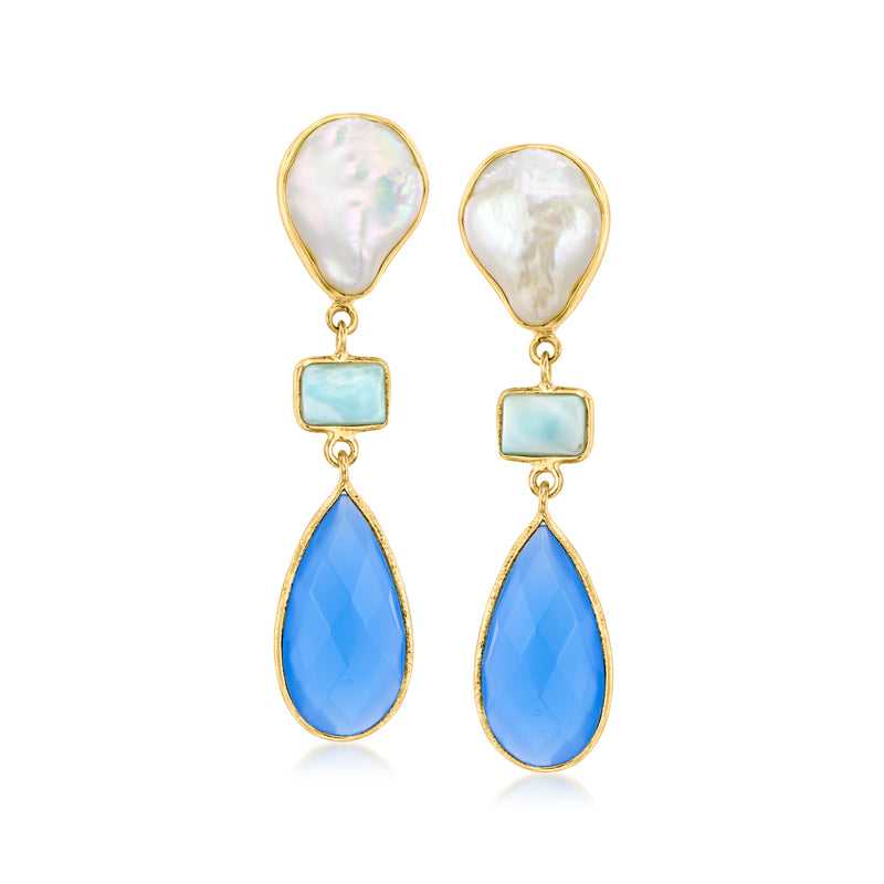 Gold-tone drop earrings with white teardrop tops and blue faceted pear stones
