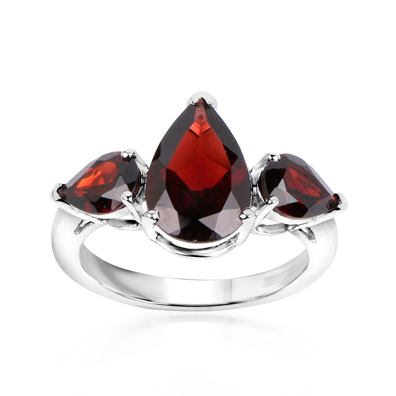 Sterling silver garnet ring with three red gemstones: marquise center, two side ovals