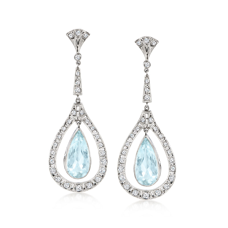 Platinum aquamarine and diamond drop earrings with teardrop halo design