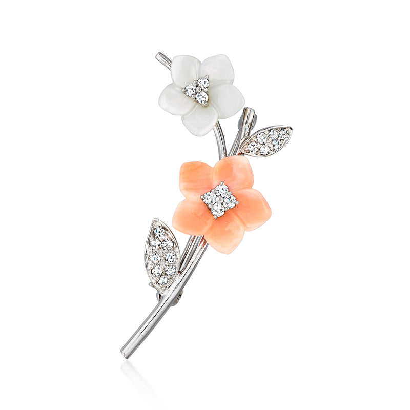 Flower vine lapel pin with coral and mother-of-pearl petals, diamond accents on white gold