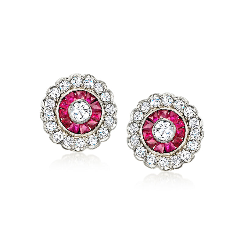 Platinum flower stud earrings with ruby and diamond halo, round center stones