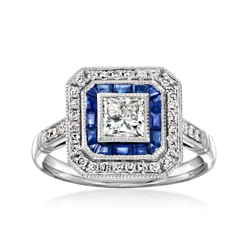 Vintage platinum ring with square center diamond, blue sapphire side accents, halo stones