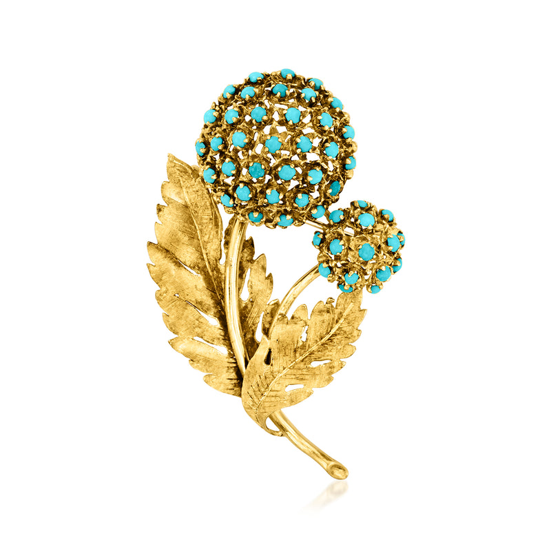 Vintage gold-tone flower pin with turquoise bead petals and two-tone leaf details