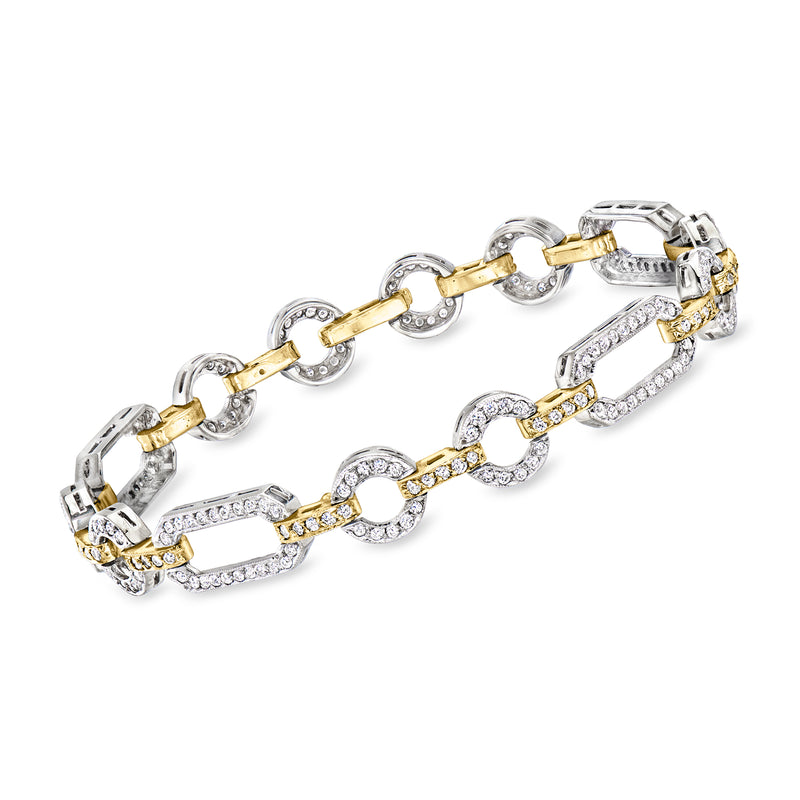 Two-tone gold multi-link diamond bracelet with oval and bar settings, hinged clasp.