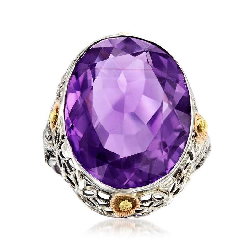 Vintage amethyst cocktail ring with large oval purple gemstone in white gold setting