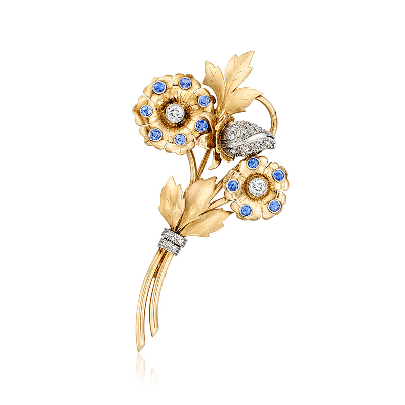 Vintage yellow gold flower bouquet pin with blue sapphire stones and diamond accents