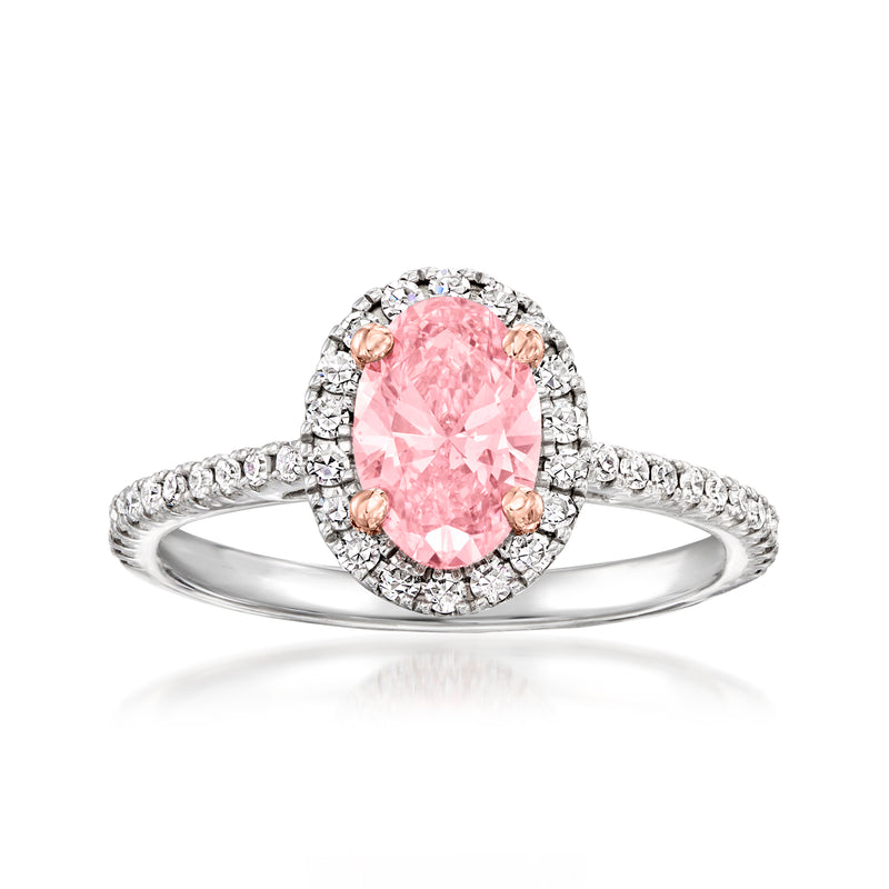 14kt white gold ring with oval pink center stone and diamond halo