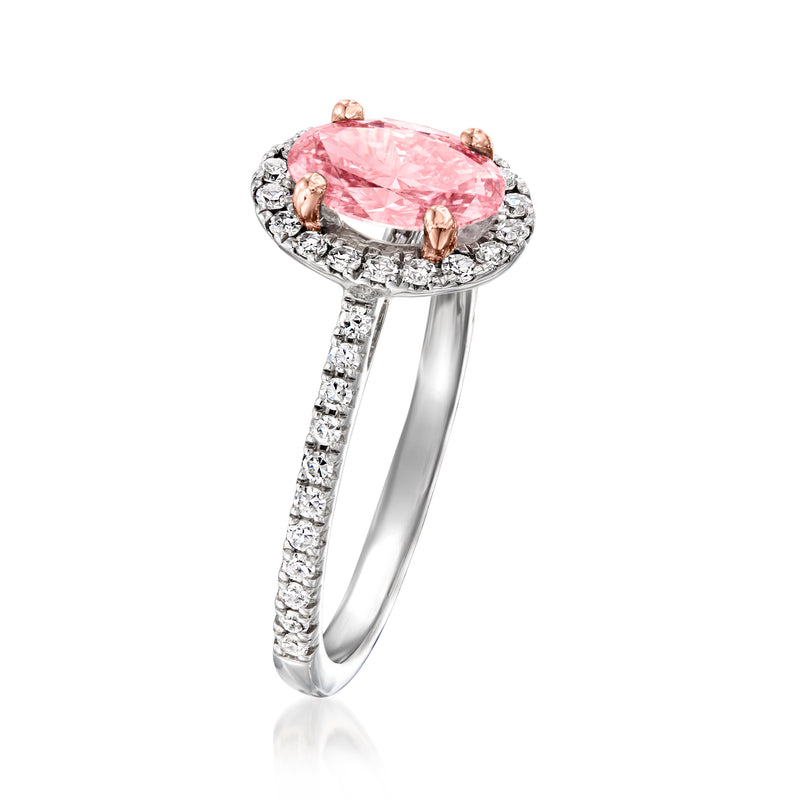 14kt white gold ring with pink oval center stone, diamond halo and pavé band