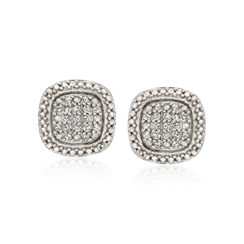 Sterling silver stud earrings with white pave center and sparkling diamond border.