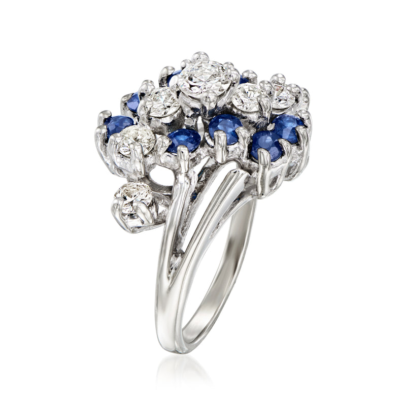 White gold vintage cluster ring with round diamonds and blue sapphires, side view