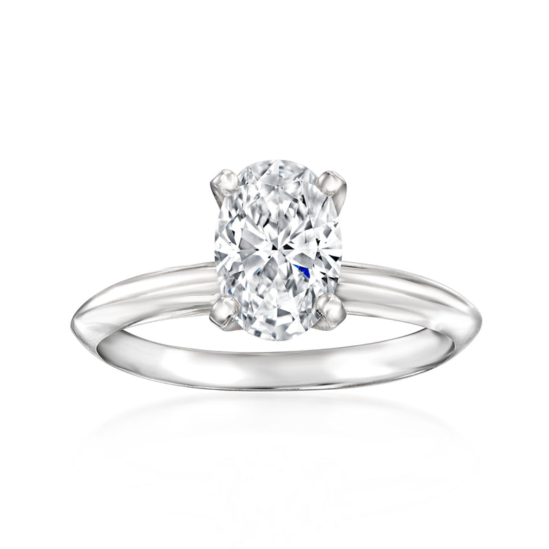 14kt white gold solitaire diamond ring with round center stone, prong-set
