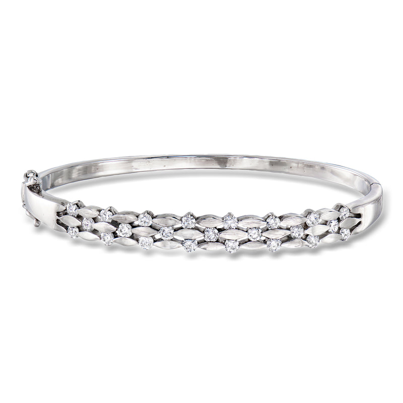 18kt white gold diamond bangle bracelet with linked round and oval stones, hinged