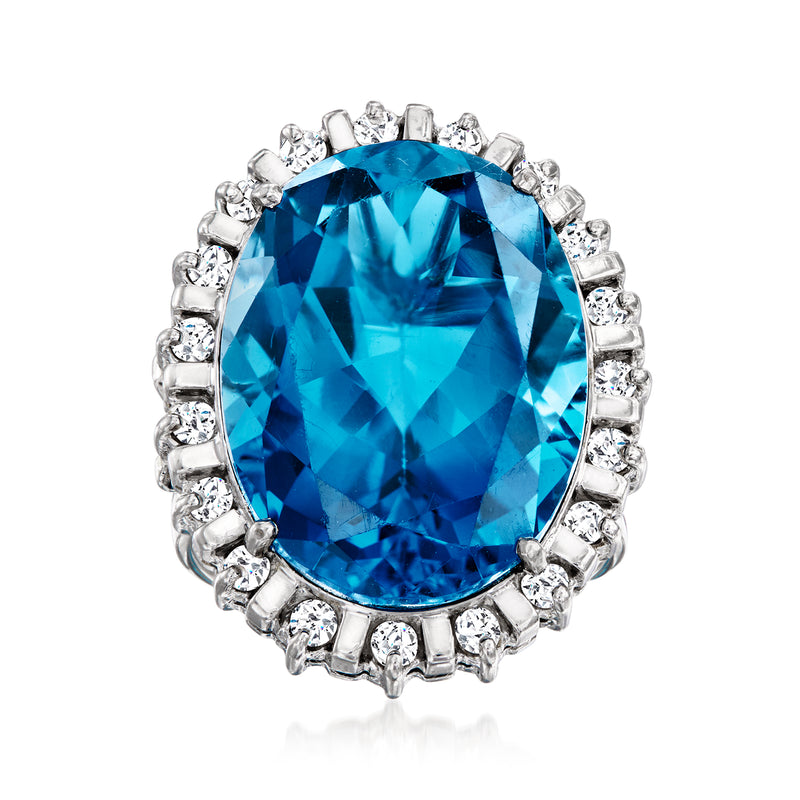 14kt white gold cocktail ring with large London blue topaz and diamond halo