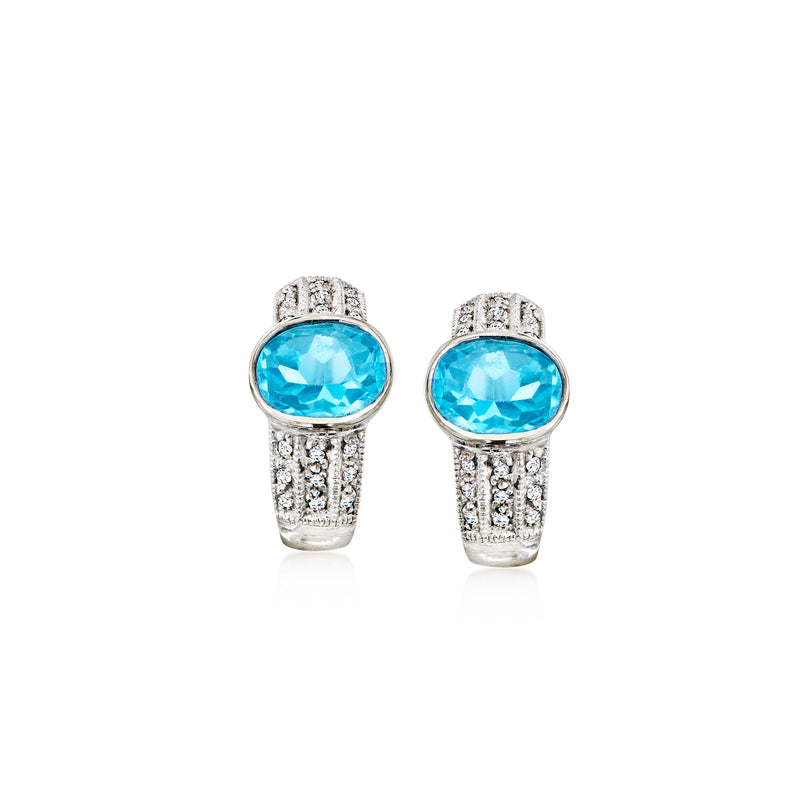 Curved oval blue topaz stud earrings with diamond pave accents, in white gold