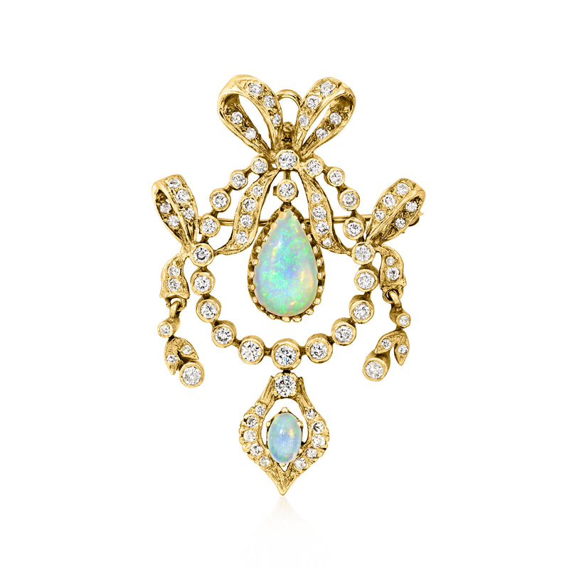 14kt yellow gold pin with teardrop opal and diamond-like round stones