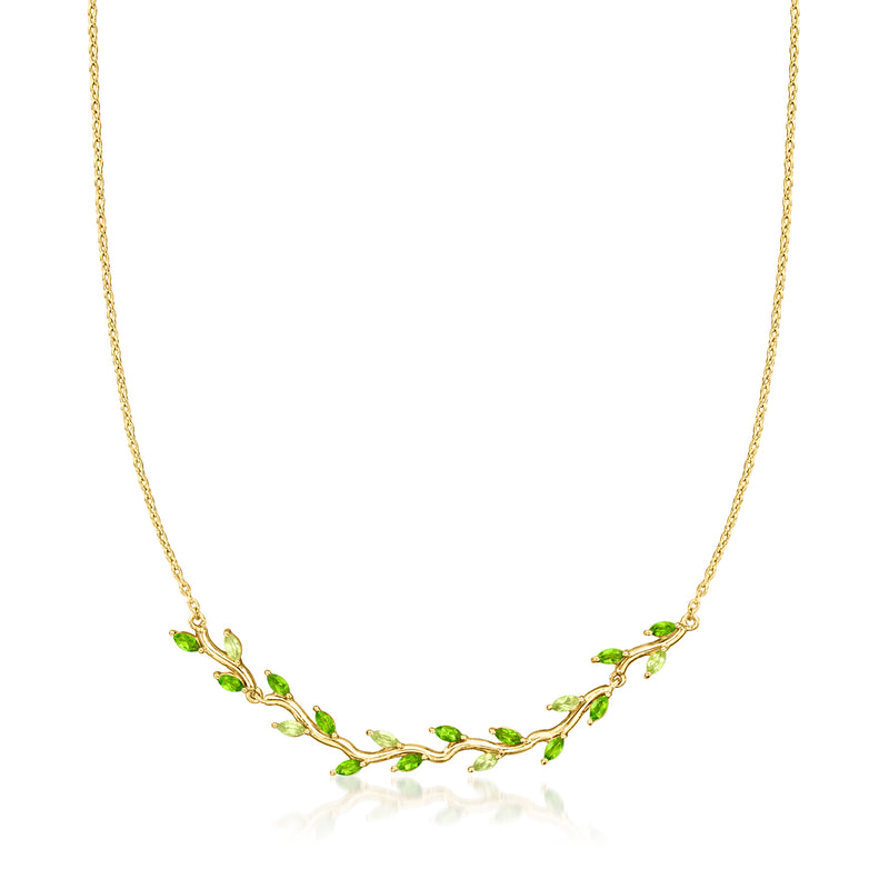 Gold leaf necklace with green gemstones, delicate chain