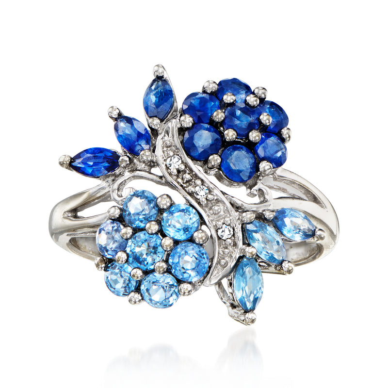 Vintage white-gold flower ring with blue sapphires and diamond accents