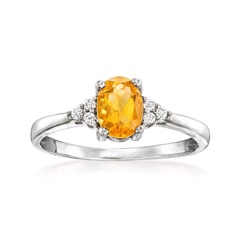 Vintage oval citrine ring with diamond halo in 14kt white gold setting